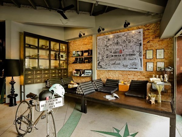 Bicycle and seating in the lounge at Bangkok Bed and Bike